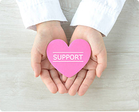 Support hands holding heart